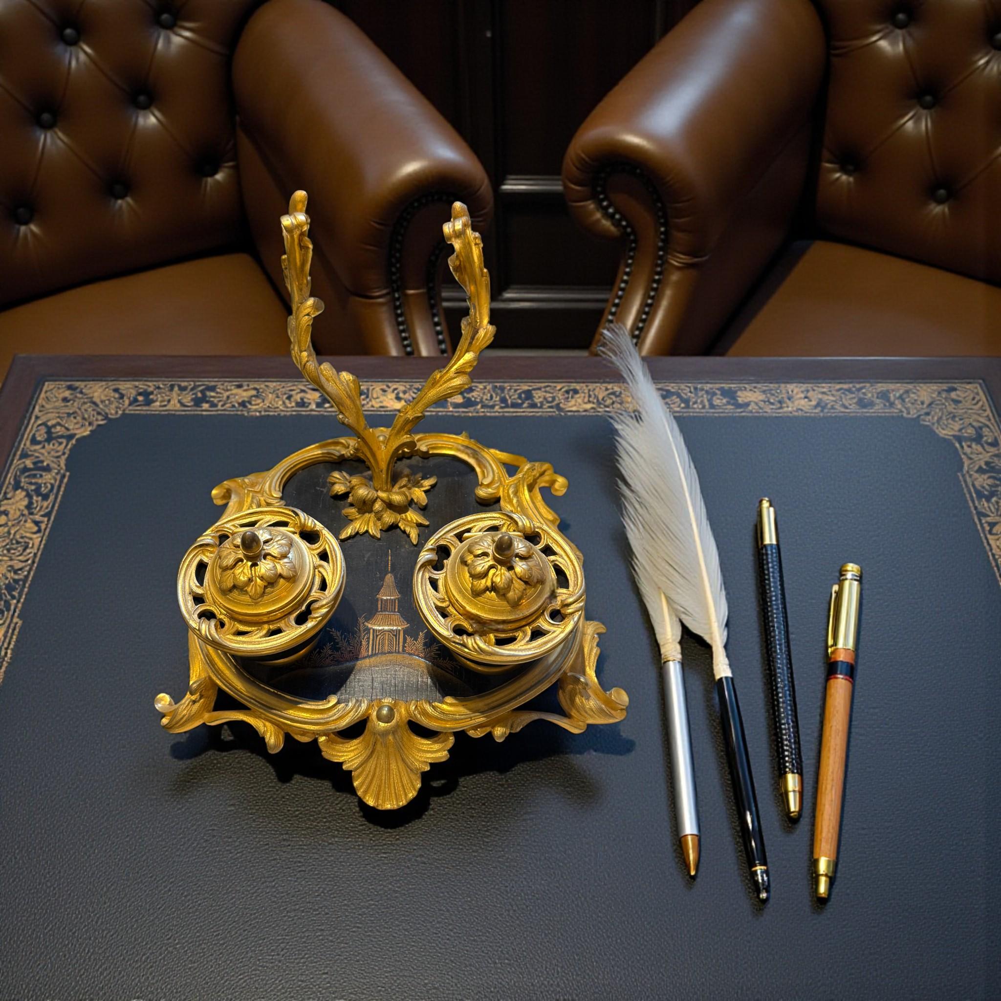 This rare Louis XV–style inkwell by François Linke (1855–1946) is crafted in Chinese lacquer and finely cast gilt bronze. Known as one of the most important Parisian cabinetmakers of his time, Linke is celebrated for the exceptional quality of his