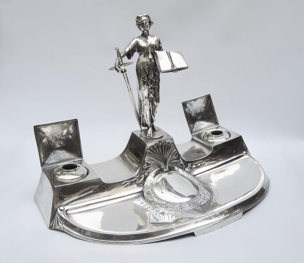 Inkwell WMF Germany (Juatice)
silver plate,
crica 1920 Art nuveau.
Art nouveau, modernist art or modernism was an international artistic and decorative movement, developed between approximately 1890 and 1914. The 'new art', as its name in French,