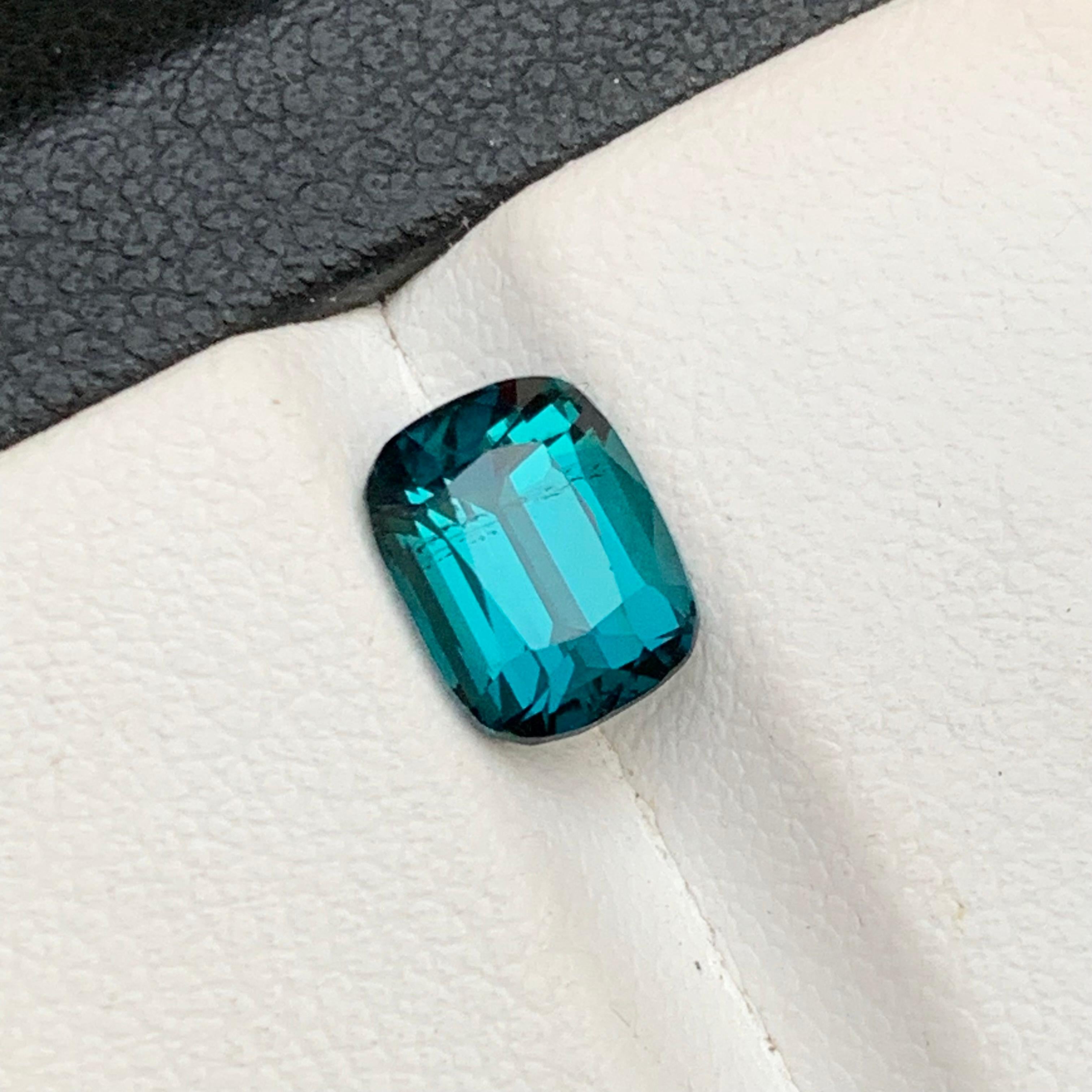 Exquisite Inky Blue Natural Tourmaline Loose Gemstones for Ring, or any other Jewelry Setting from Kunar, Afghanistan
 
💎 GEMSTONE TYPE: Tourmaline
⚖️ WEIGHT: 1.90 Carats
🪚 SHAPE & CUT: Cushion Cut
📏 SIZE (MM): 8.13 x 6.18 x 4.97
🌈 COLOR: Inky