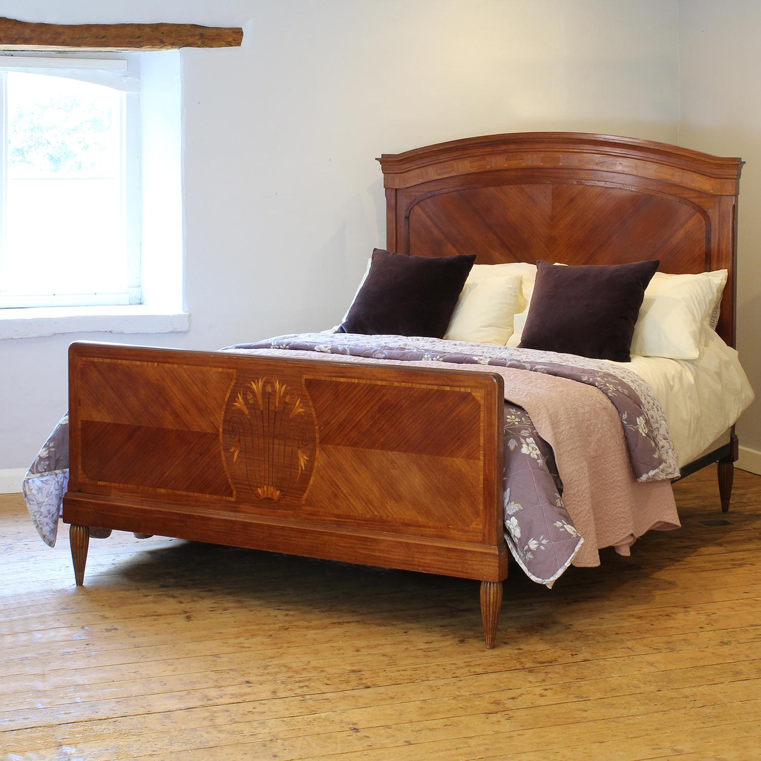 A fine antique bed with inlaid panels.

This bed accepts a British king size or American queen size, 5ft wide (60 inches or 150cm) base and mattress set.

The price includes a deep firm bed base to support the mattress.

The mattress bedding