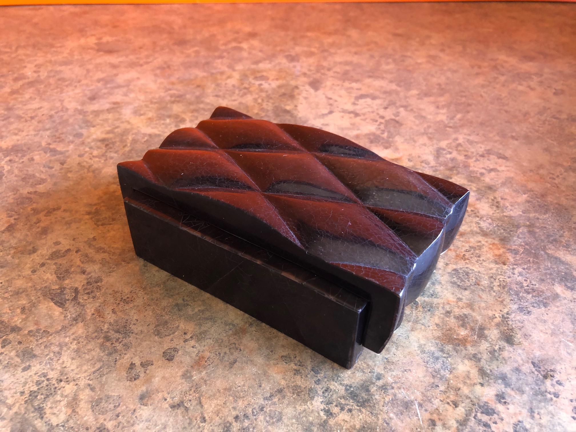 Gorgeous inlaid black shell and bone decorative trinket box by A&Y Augousti of Paris, circa 1990s. The box is made of wood with a intricate diamond pattern shell overlay and is in excellent condition.  #503