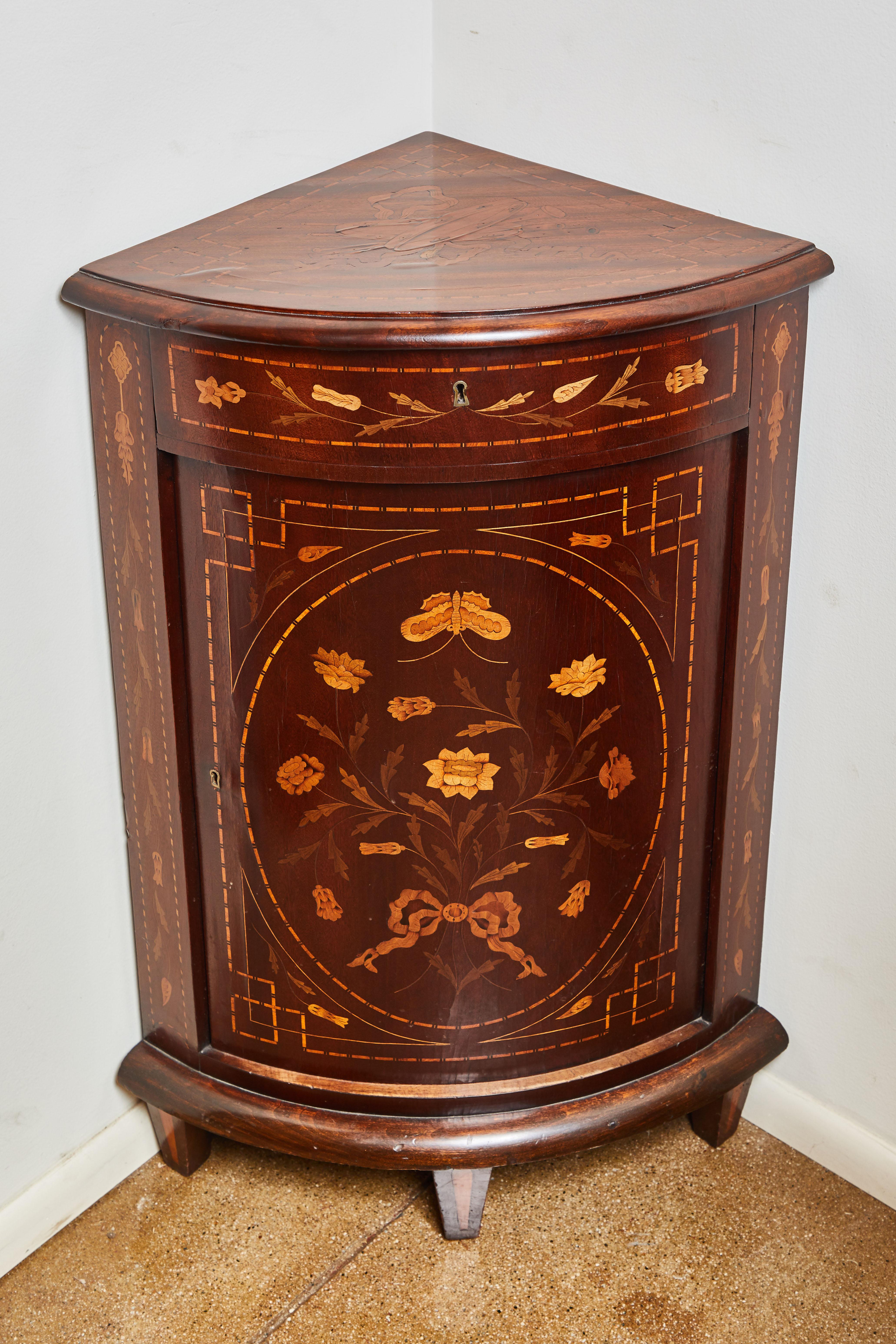 18th century inlaid corner piece
Exquisite piece of furniture with beautiful inlays of various veneers.