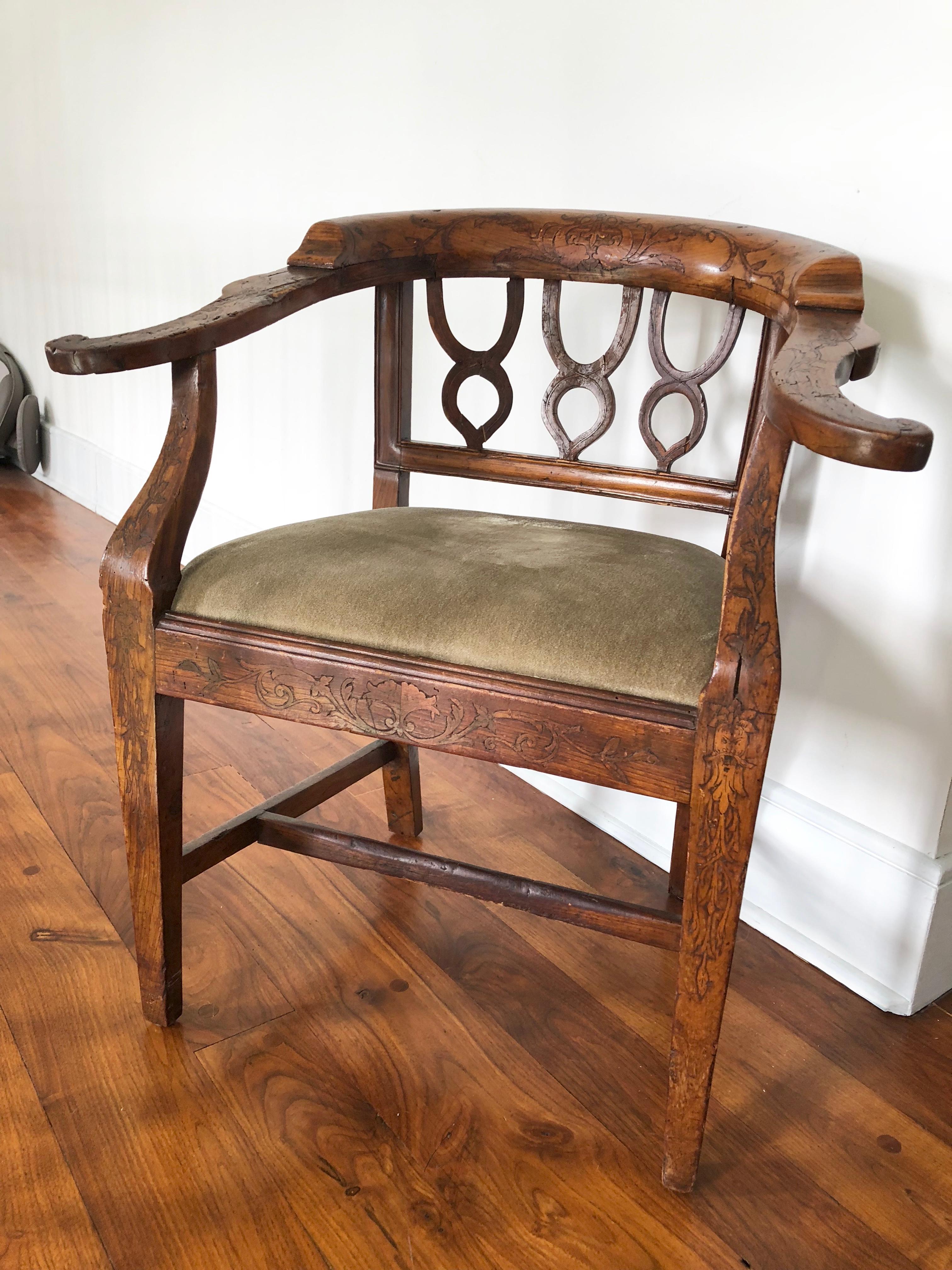 A nice early 19th century yoke-back desk chair with subtle inlay throughout, with an upholstered seat covered in tan velvet, French, circa 1850.