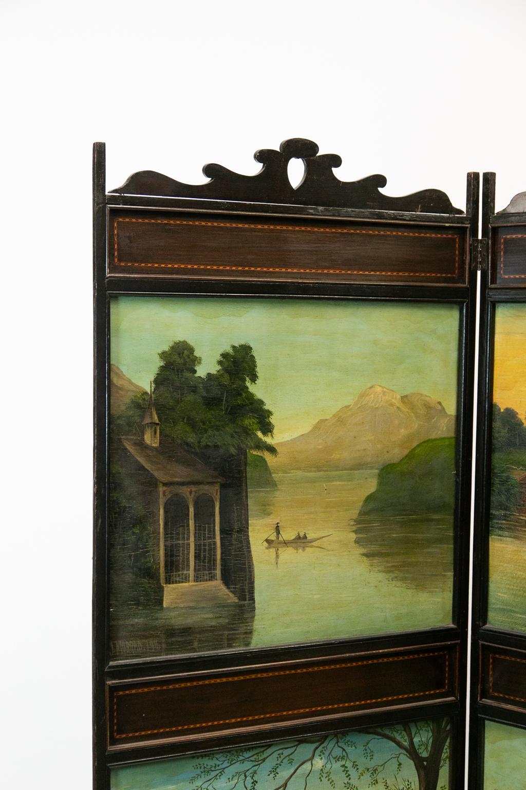 Inlaid English mahogany two fold screen has hand painted oil paintings on wood which depict Cotswold and lake scenes.


 