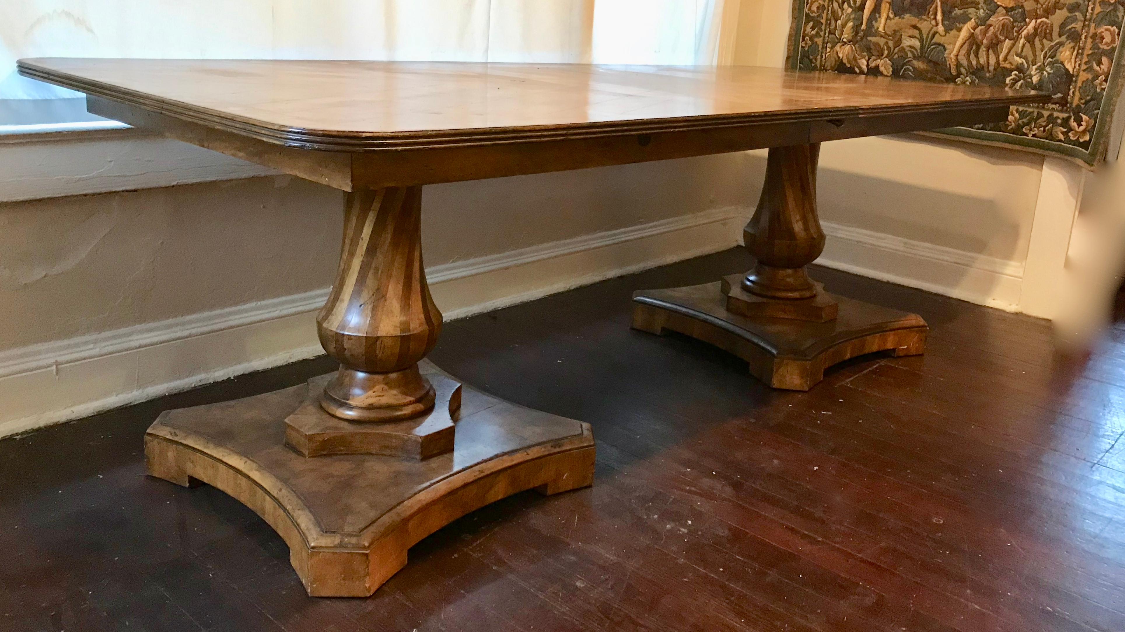 This is an impressive custom dining table from a large Palm Beach residence.
The dining Table is 8ft long with a leaf which is 18 inches, in total is 114 inches long 30 high and 42 wide.
Very heavy quality twin pedestal form, with the top having