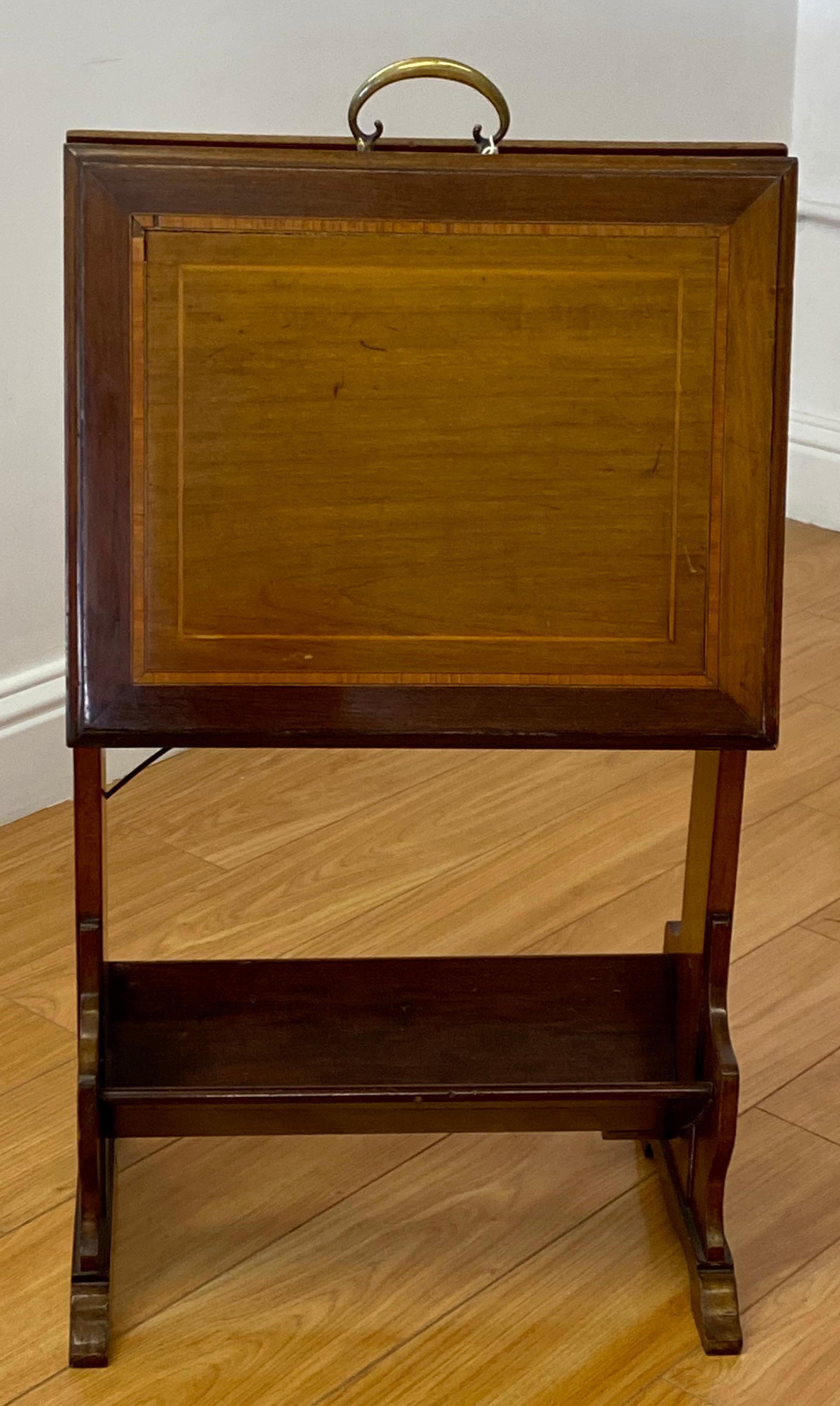 Inlaid mahogany folding art stand, c. 1910. 

This wonderful artist portfolio stand can be used as a magazine rack, or as the art stand it was intended for. 

Unique and wonderful early 20th century piece of furniture. 

Lovely maple inlay.