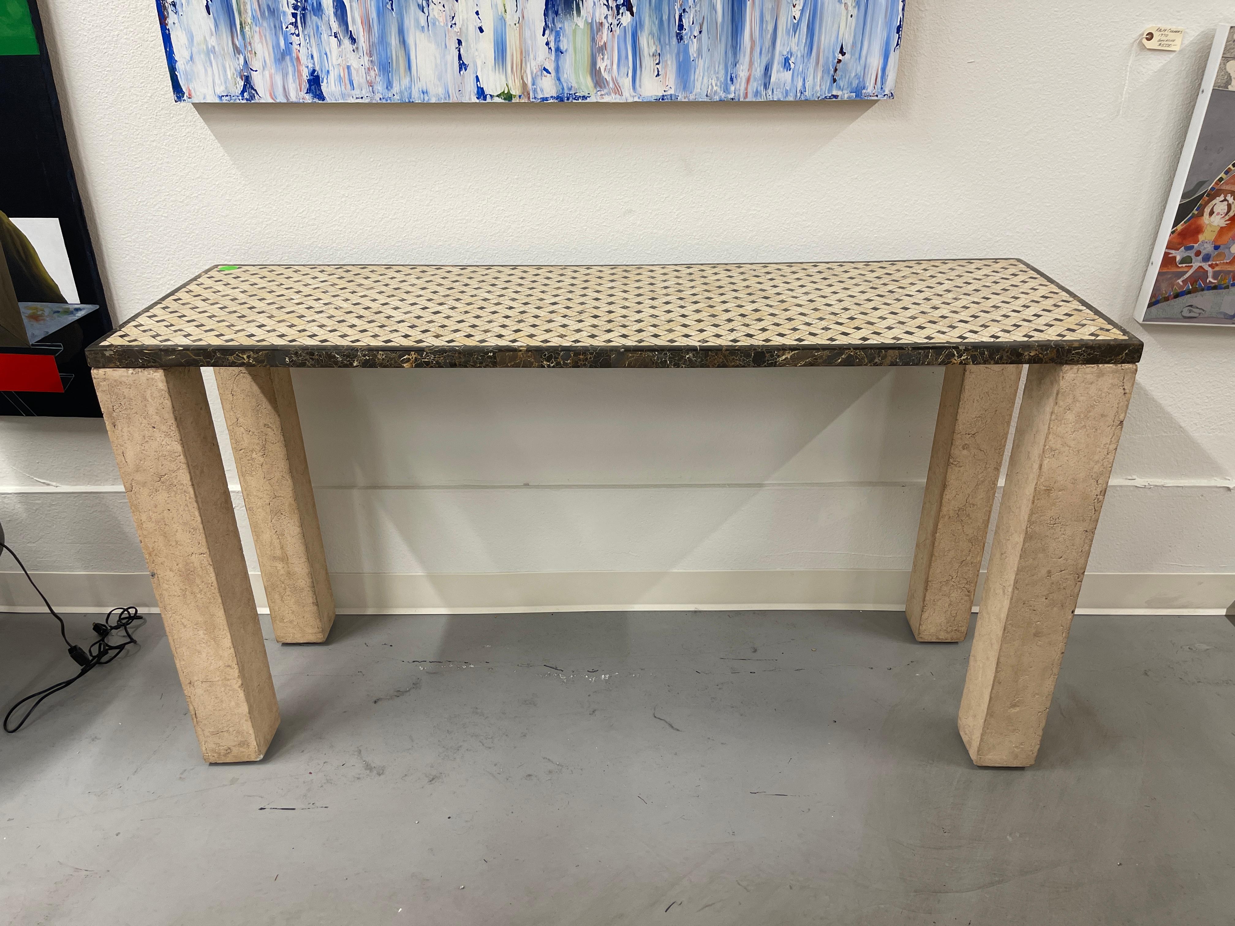 Beautiful basket weave inlaid marble top console with stone legs. Nice color and pattern on top. In good condition, the table has some age and wear most notable to the legs, please see the detailed photos.