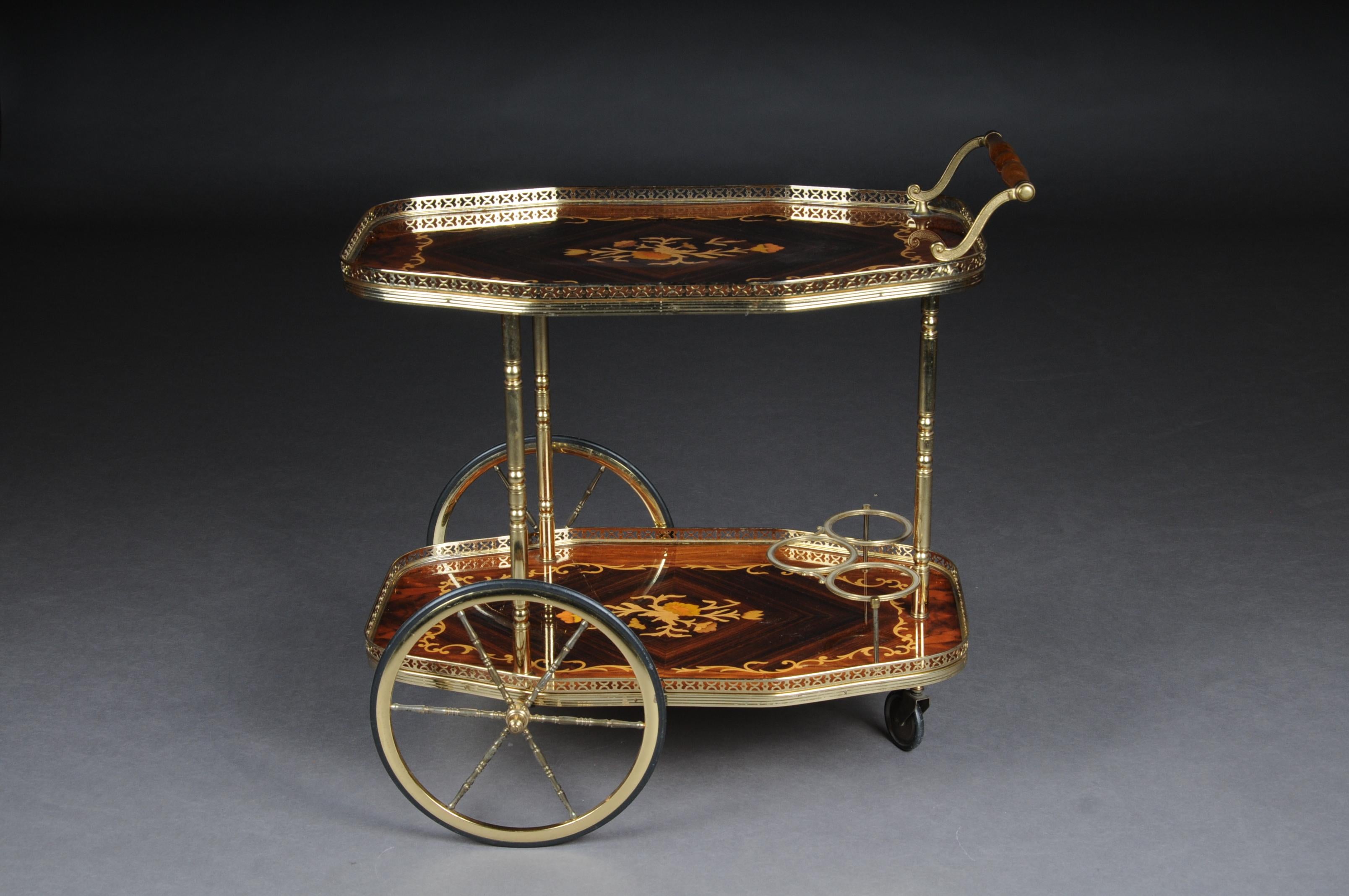 Inlaid table bar table, Italy, circa 1960

Walnut root inlaid on solid wood. 2 shelves on wheels. Rich in brass applications and inlaid inserts.

(V-162).