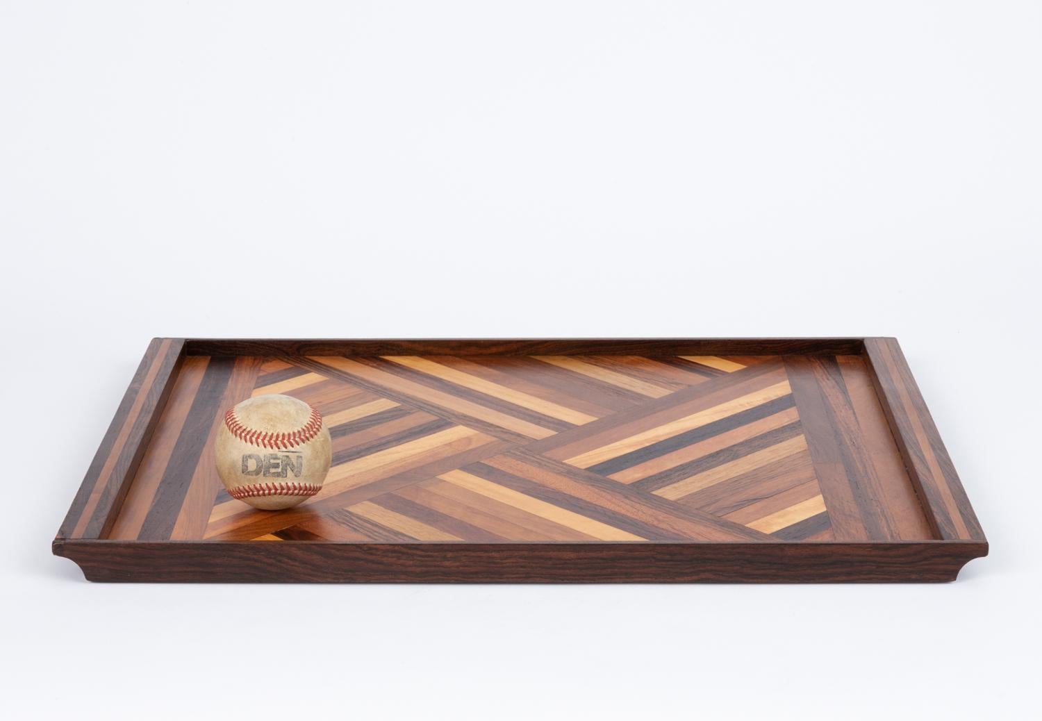 Always interesting and never boring, here we present to you Don Shoemaker’s rosewood detailed serving tray for his company Señal in the 1960s. Shoemaker is known for the marquetry in his tray’s- I don’t think we’ve ever had two of the same come in,