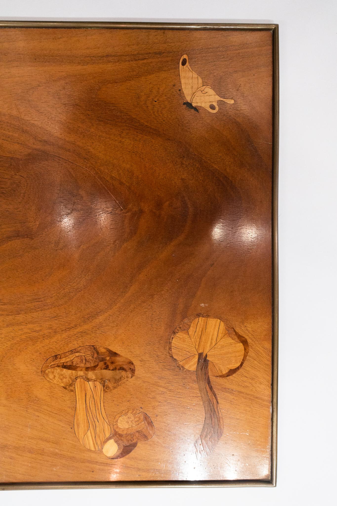 Beautifully executed inlaid wooden panel or table top with mushrooms and a butterfly. This piece was originally sold in the Christian Dior 