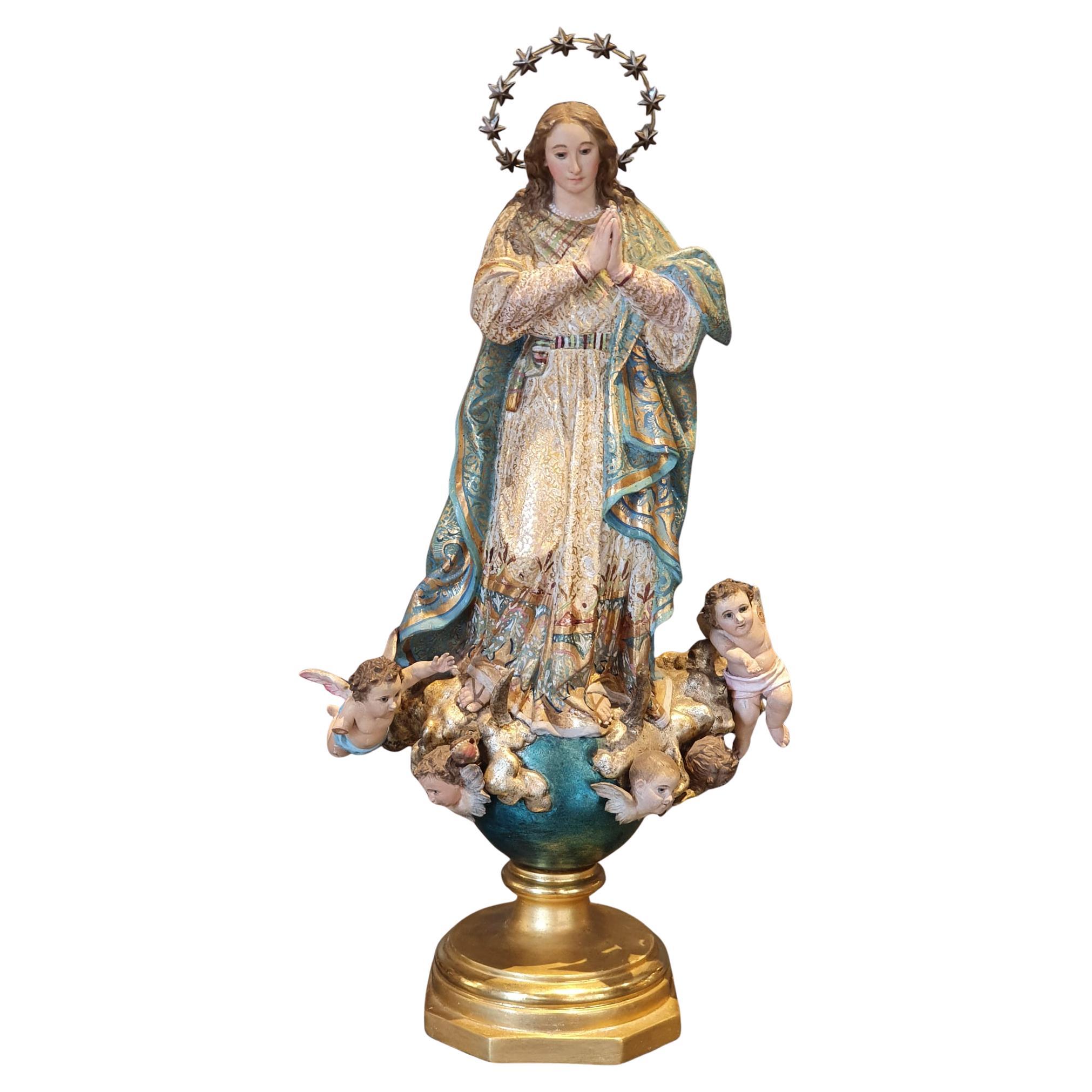 Immaculée Conception polychrome en bois sculpté, XIXe siècle.