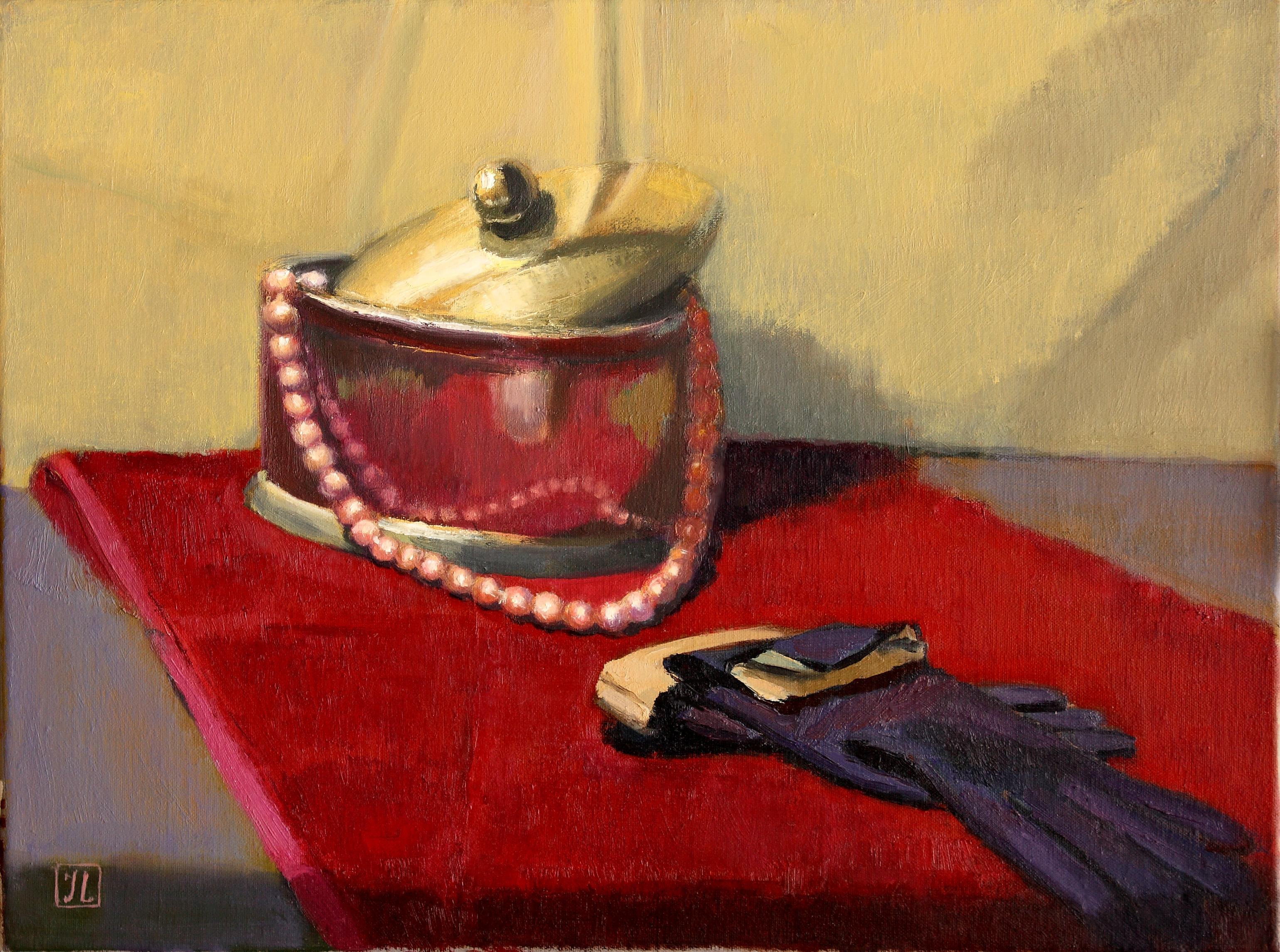 A string of pink pearls, a silver jewelry box, a pair of purple kid gloves â€“ all on a red velvet top.  The air of this painting suggests a story.  You can imagine a beautiful woman coming back from an evening out.  Was it there fun and joy or