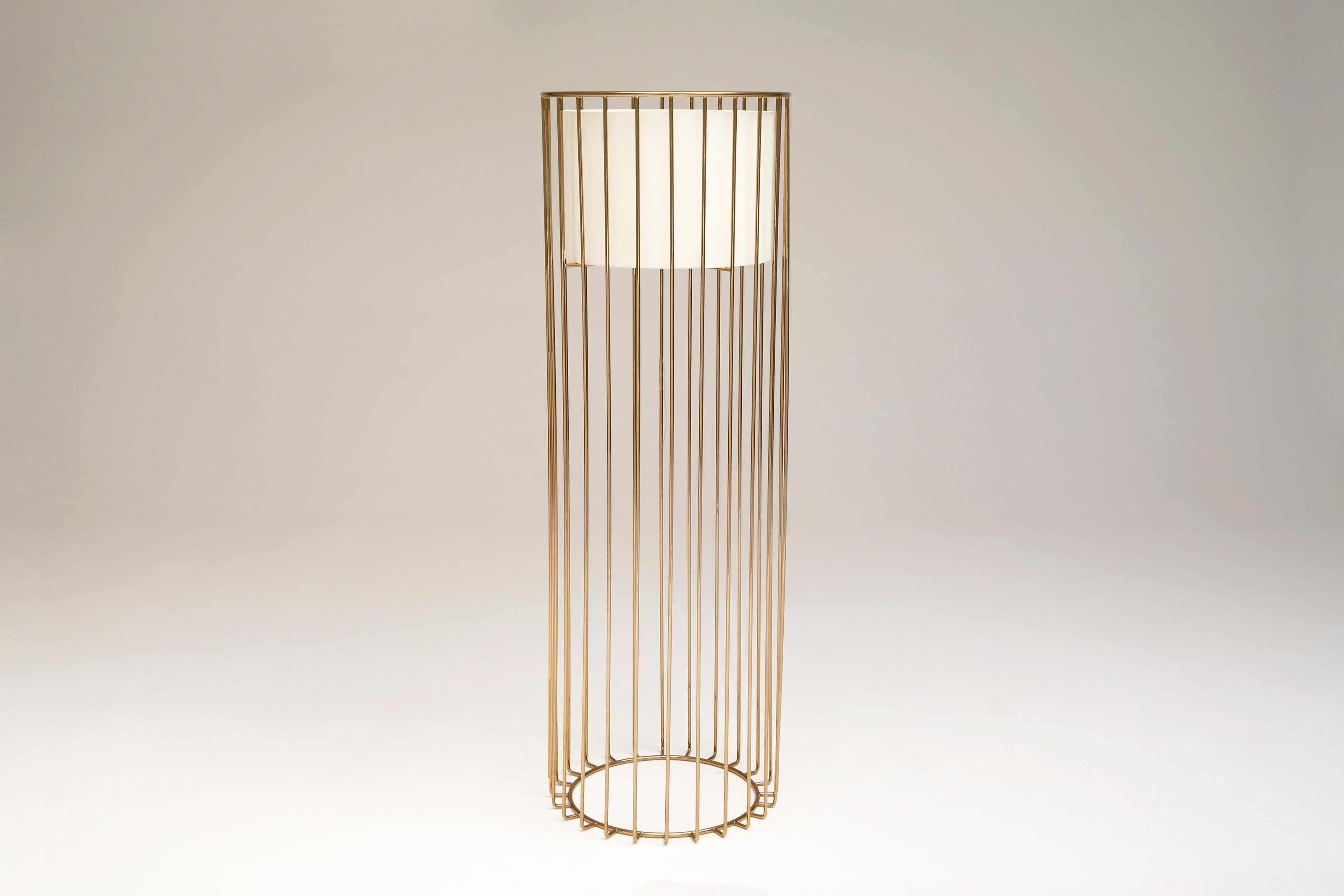 Inner Beauty Tall Floor Light by Phase Design
Dimensions: Ø 61 x H 182.9 cm. 
Materials: Linen and smoked brass.

Solid steel bar available in a smoked brass, polished chrome, burnt copper, gloss or flat black and white powder coat. Powder coat