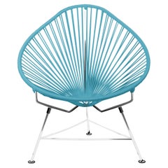 Innit Designs: Acapulco-Stuhl mit blauem Gewebe auf Chromrahmen