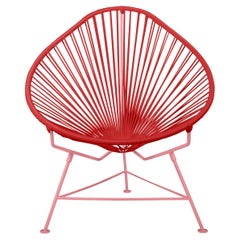 Innit Designs fauteuil Acapulco tissé rouge sur cadre corail