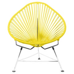 Innit Designs chaise Acapulco tissée en jaune sur cadre chromé