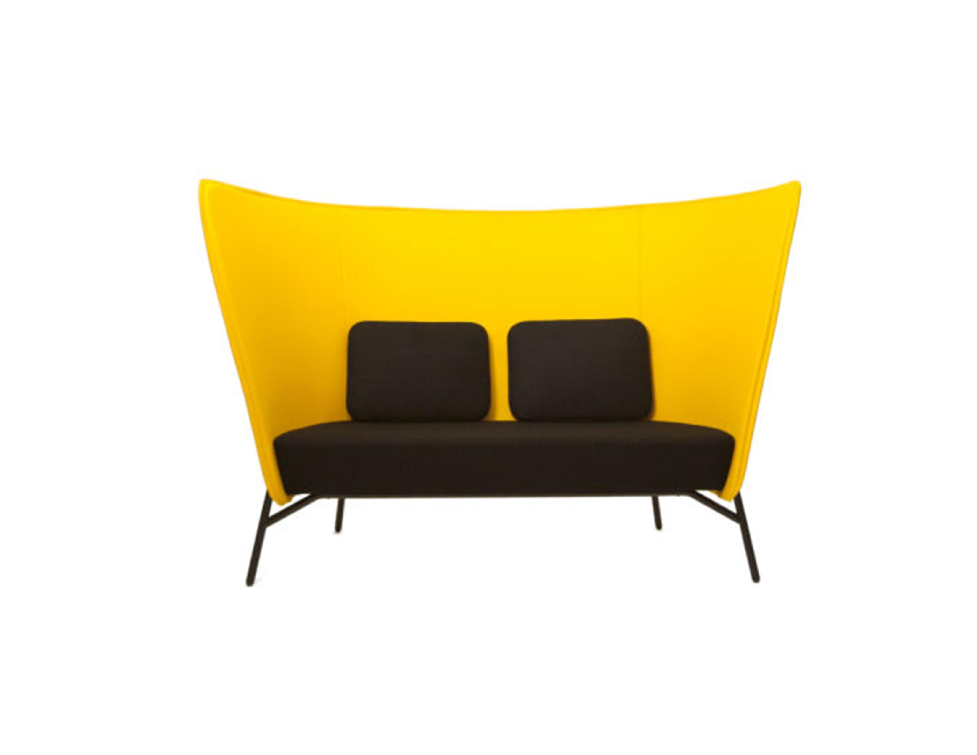 Aura sofa L is defined by its sheltering high back that creates a secluded niche even in the busiest of environments. The high sculptural form of the 2-seat sofa is a striking architectural element, but it also offers privacy and withdrawal in open