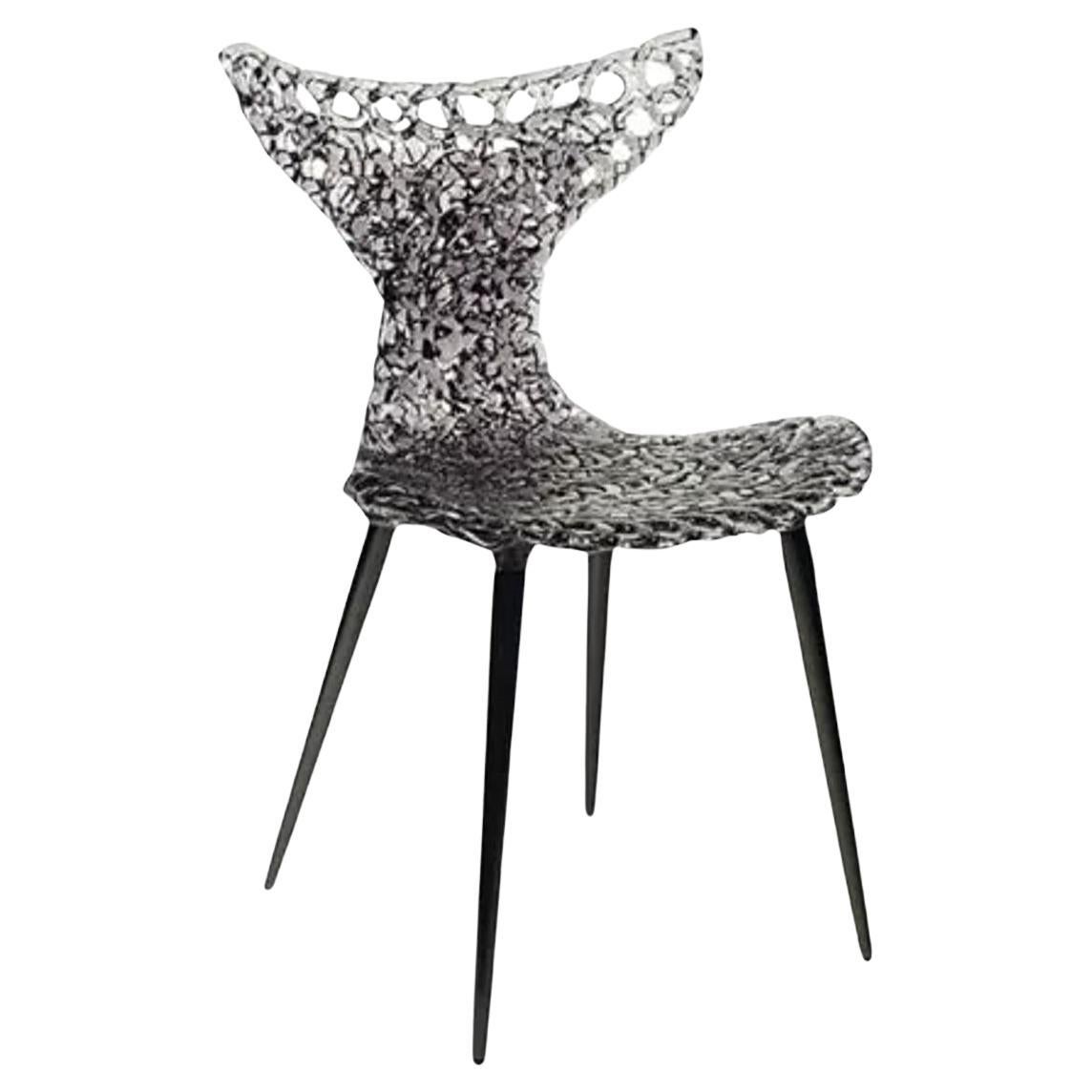 Silla innovadora - Diseño fluido con reflejos luminosos y atrevidas opciones de color