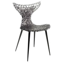 Silla innovadora - Diseño fluido con reflejos luminosos y atrevidas opciones de color