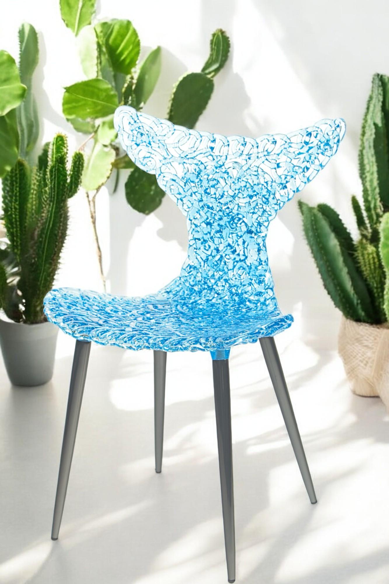 Ispirata ai movimenti aggraziati di un pesce, la sedia Innovative presenta un design giocoso a coda rovesciata, che cattura sia la fluidità che l'eleganza. Questa sedia moderna è molto più di una semplice soluzione per sedersi: è un cattura-luci che