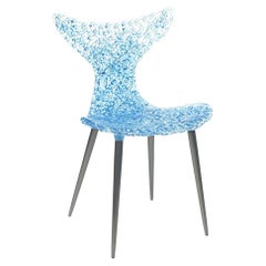 Silla innovadora - Diseño fluido con reflejos luminosos y atrevidas opciones de color