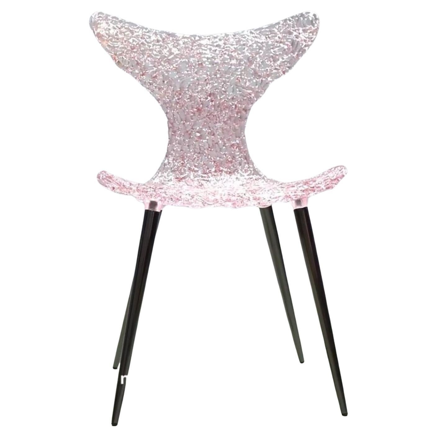 Silla innovadora - Diseño fluido con reflejos luminosos y atrevidas opciones de color