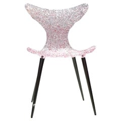 Silla innovadora - Diseño fluido con reflejos luminosos y atrevidas opciones de color