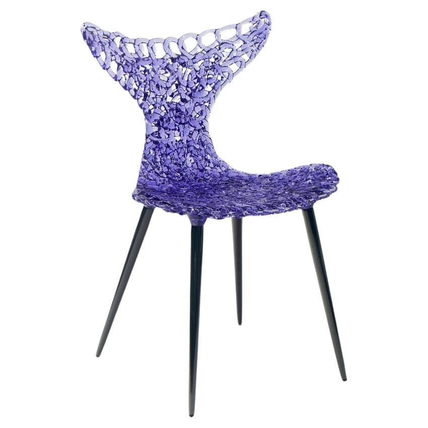 Silla innovadora - Diseño fluido con reflejos luminosos y atrevidas opciones de color
