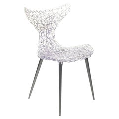 Silla innovadora - Diseño fluido con reflejos luminosos y atrevidas opciones de color