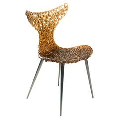 Innovative Chair – Fluid Design with Lighting Reflections and Bold Color Options