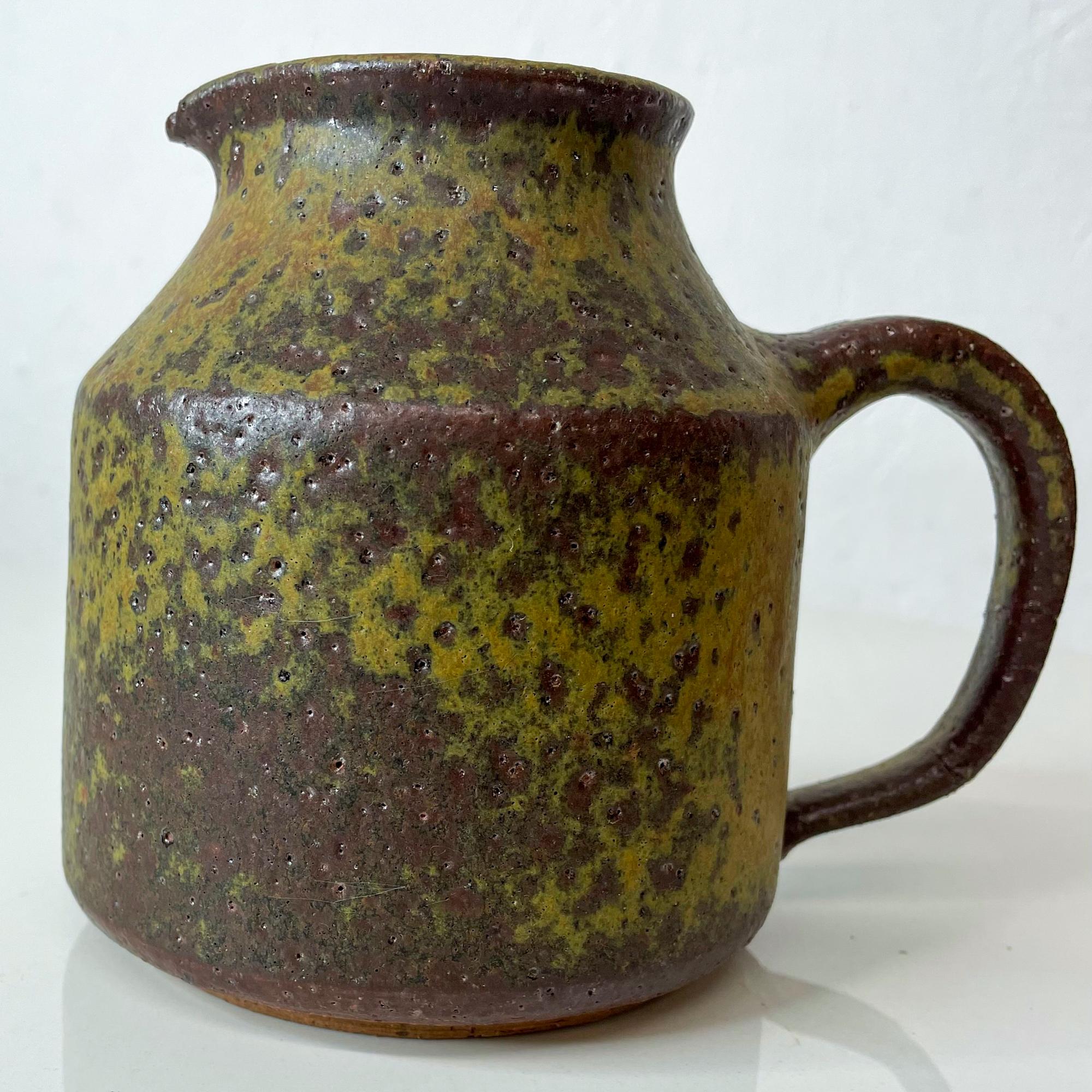 ceramic pottery yellow jug