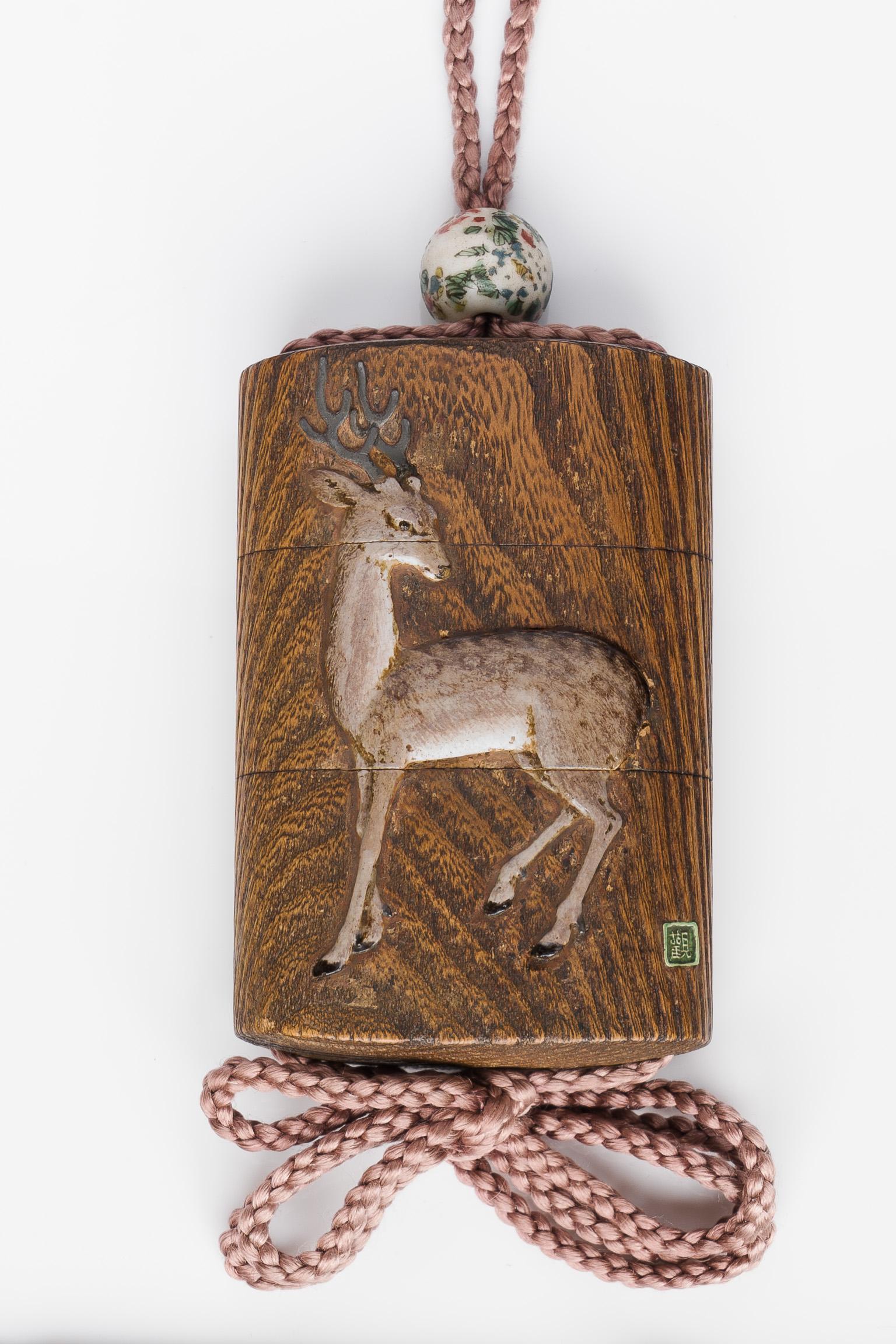Mochizuki Hanzan (1743-90?)
Edo Period, 18th century

Decorated with inlaid colored ceramic with a stag and maple leaves

Height: 8.4 cm

Sealed Hanzan

 

Mochizuki Hanzan (1743-90?) was one of the most talented followers of Ogawa Haritsu
