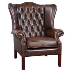 Insanely colored Chesterfield wingback armchair.