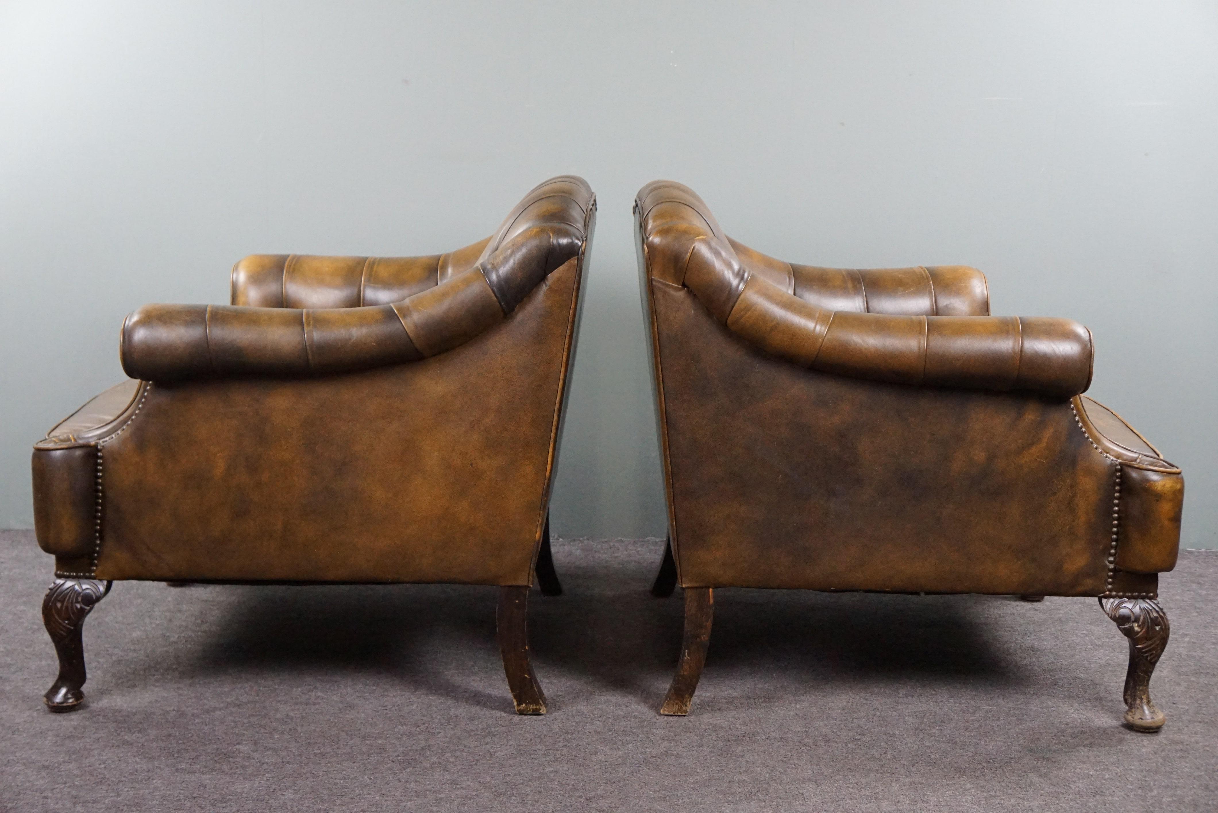 Insanely unique set of two cowhide leather Chesterfield armchairs/arm chairs For Sale 1