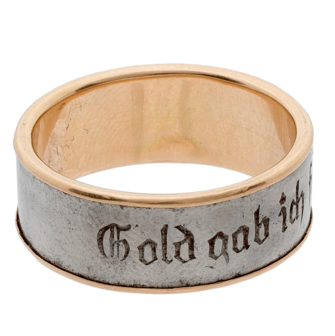 First World War (or Patriotic) Iron Ring with Inscription “Gold gab ich für Eisen”
Austro-Hungarian Empire, circa 1919
Gold and Iron
Outer diameter 21 mm., width of band 8 mm.
Weight 4 gr., US size 7, UK size O

Just as wedding rings mark the