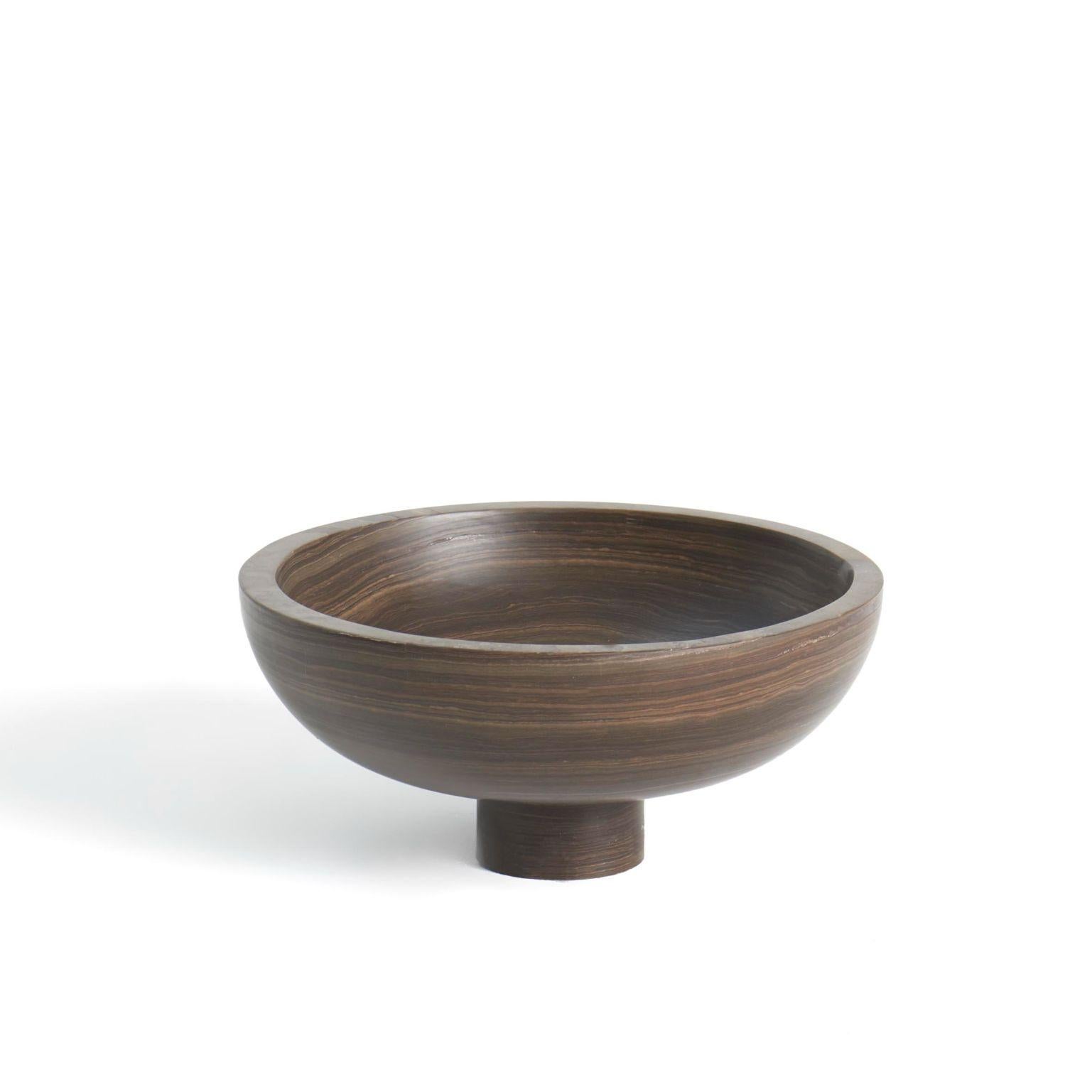 Inside Out Bowl by Karen Chekerdjian
Dimensions: 31 x 14 cm
Materials: Tobacco Brown

Also available: Red, black, tobacco brown marbles

The value of change in a simple act. Karen Chekerdjian’s creation puts design front and centre: from one
