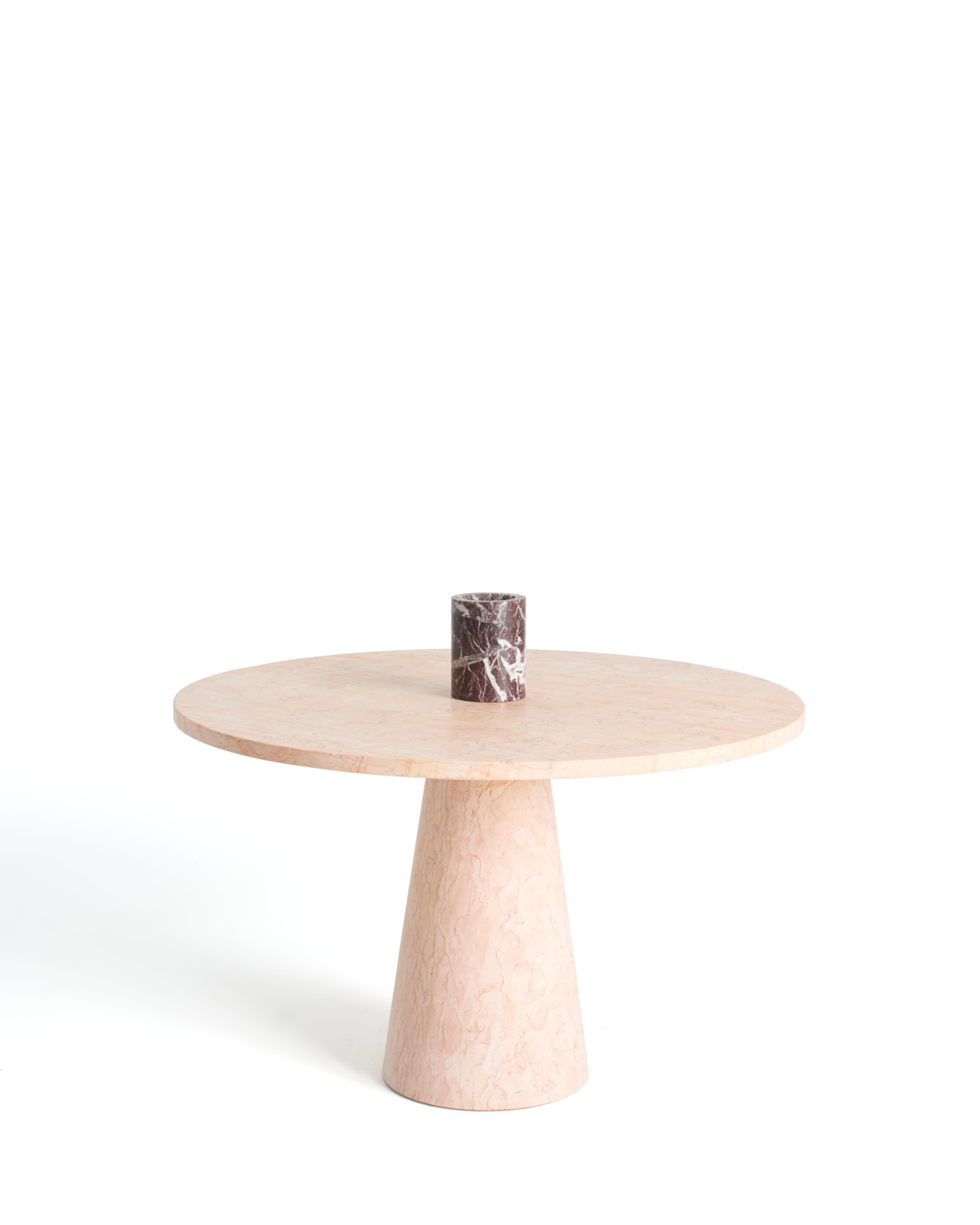 Inside out dining table by Karen Chekerdjian
Dimensions: Ø top 120 x Ø base 40 x 74
Materials: Rosa Egiziano

Karen’s trajectory into designing was unsystematic, comprised of a combination of practical experience in various creative fields and