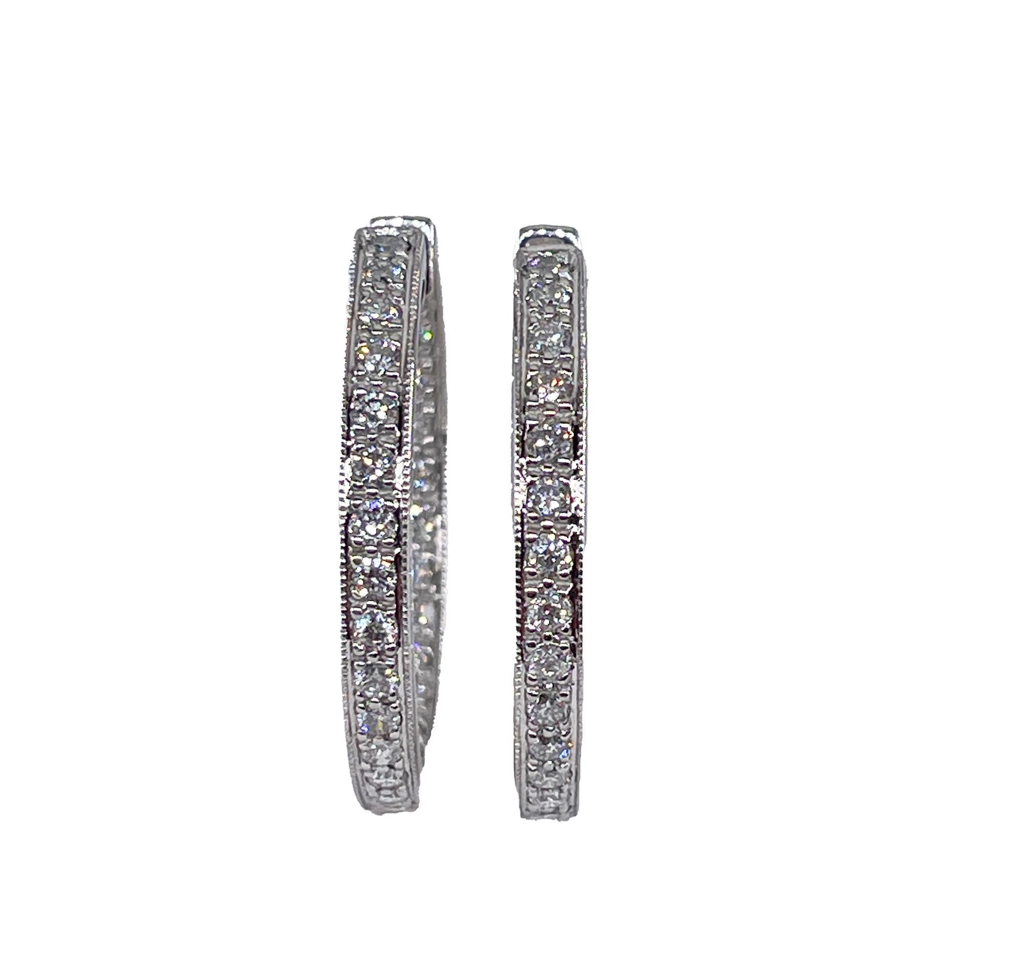 30mm Inside Out Estate Round Pave 3.0ctw Diamond 14k White Gold Hoop Earrings

This great pair will make the perfect gift: 14k white gold Round inside-out diamond hoop earrings. Quality and timeless style. From our Estate Collection. Diamond hoop