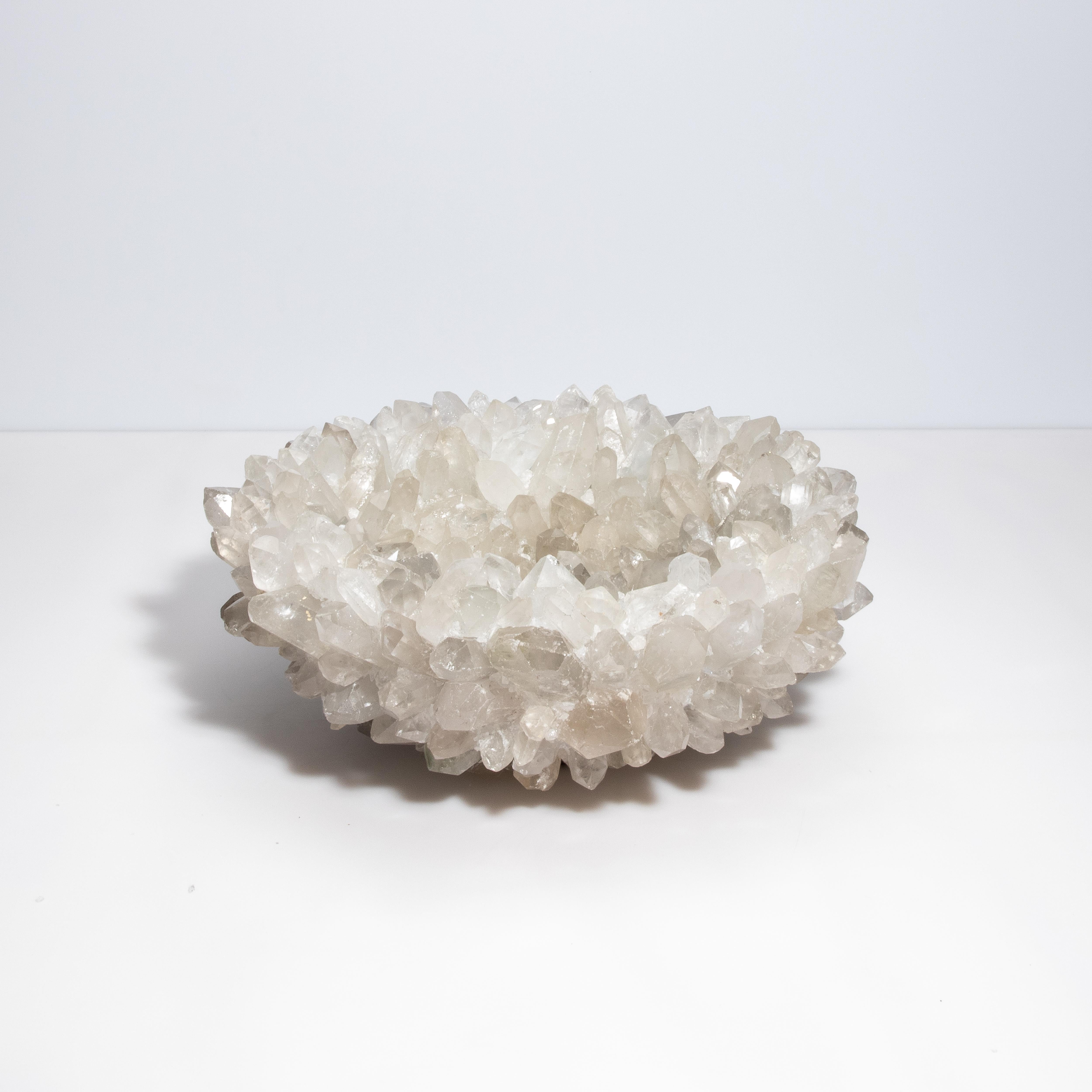 Indulge in the captivating allure of Kathryn McCoy's Rock Crystal Collection, a masterpiece that seamlessly blends nature's raw beauty with exquisite craftsmanship. Available in various sizes and customizable with a selection of different rock