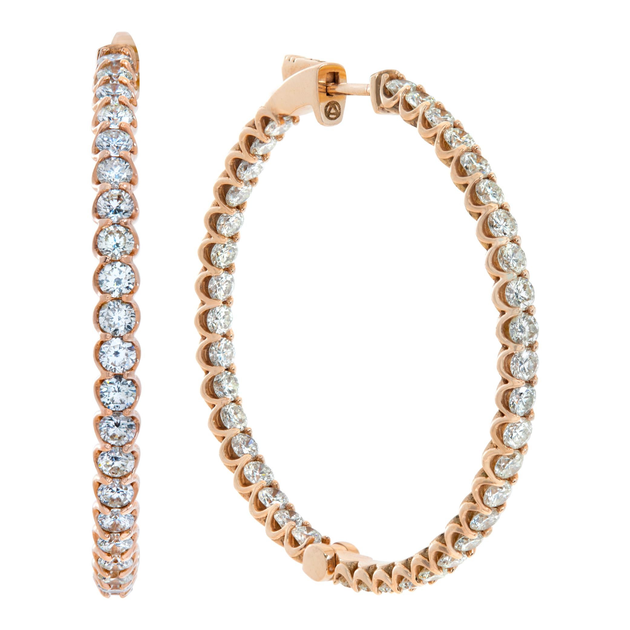 Inside-out diamond hoops earrings set in 14k rose gold. Round brilliant cut diamonds total approx. weight: 5.02 carats, estimate: G-H color, SI clarity. Hanging length 1.53 inches.