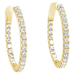 "Boucles d'oreilles en or jaune 18 carats, diamant naturel, 1,34 carats au total.