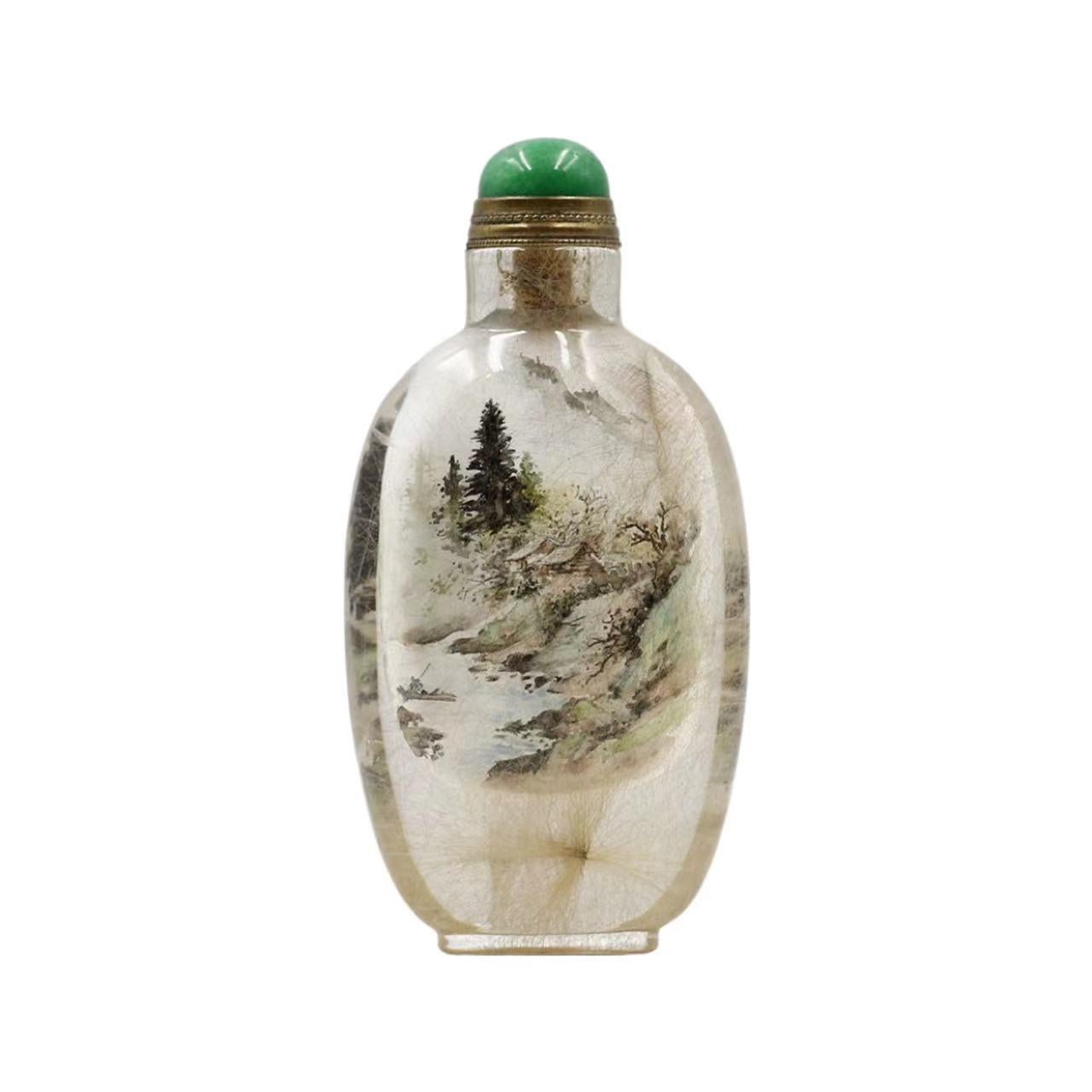 Zhang Zenglou was born in Hebei Province in 1956. He is a master of contemporary Chinese inside painted snuff bottle in Ji school. He is currently a researcher at the China Academy of Art, chairman of the Hebei Provincial Institute of Inside