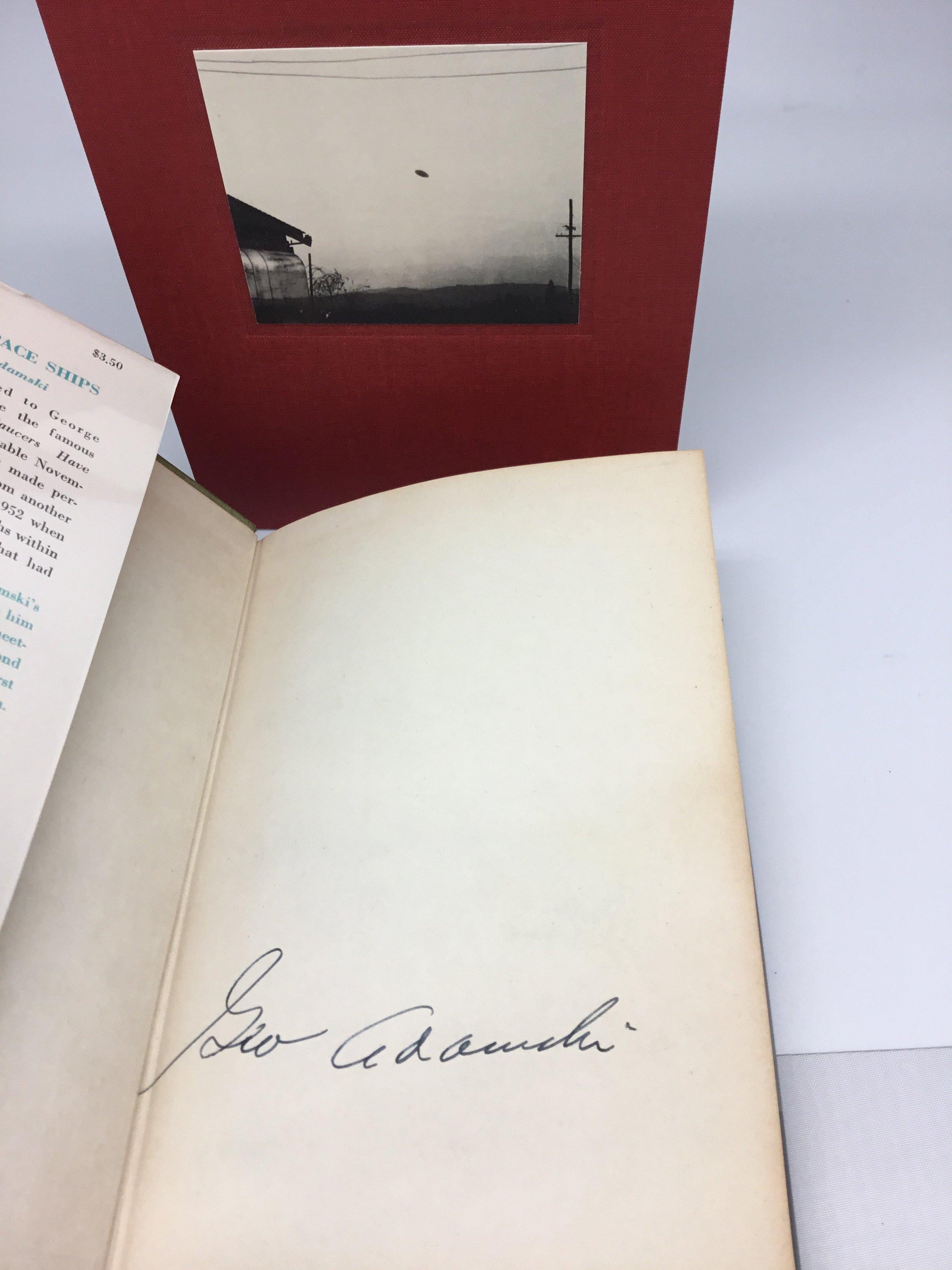 Adamski, George. Inside the Space Ships. New York: Abelard-Schuman, 1955. Signed first edition, third printing. Original dust jacket. Housed in custom slipcase.

Are we alone in the universe? This timeless question is addressed by George Adamski