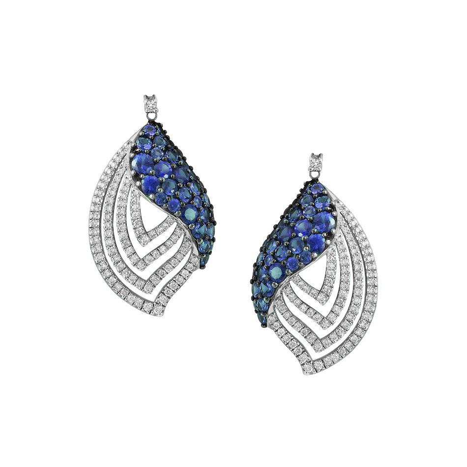 Ring White Gold 14 K (Match Earrings Available)

Diamond 30-RND-0,15-G/VS1A
Diamond 29-RND-0,07-G/VS1A
Blue Sapphire 3-0,3ct
Blue Sapphire 26-0,74ct

Weight 5.12 grams
Size 17

With a heritage of ancient fine Swiss jewelry traditions, NATKINA is a
