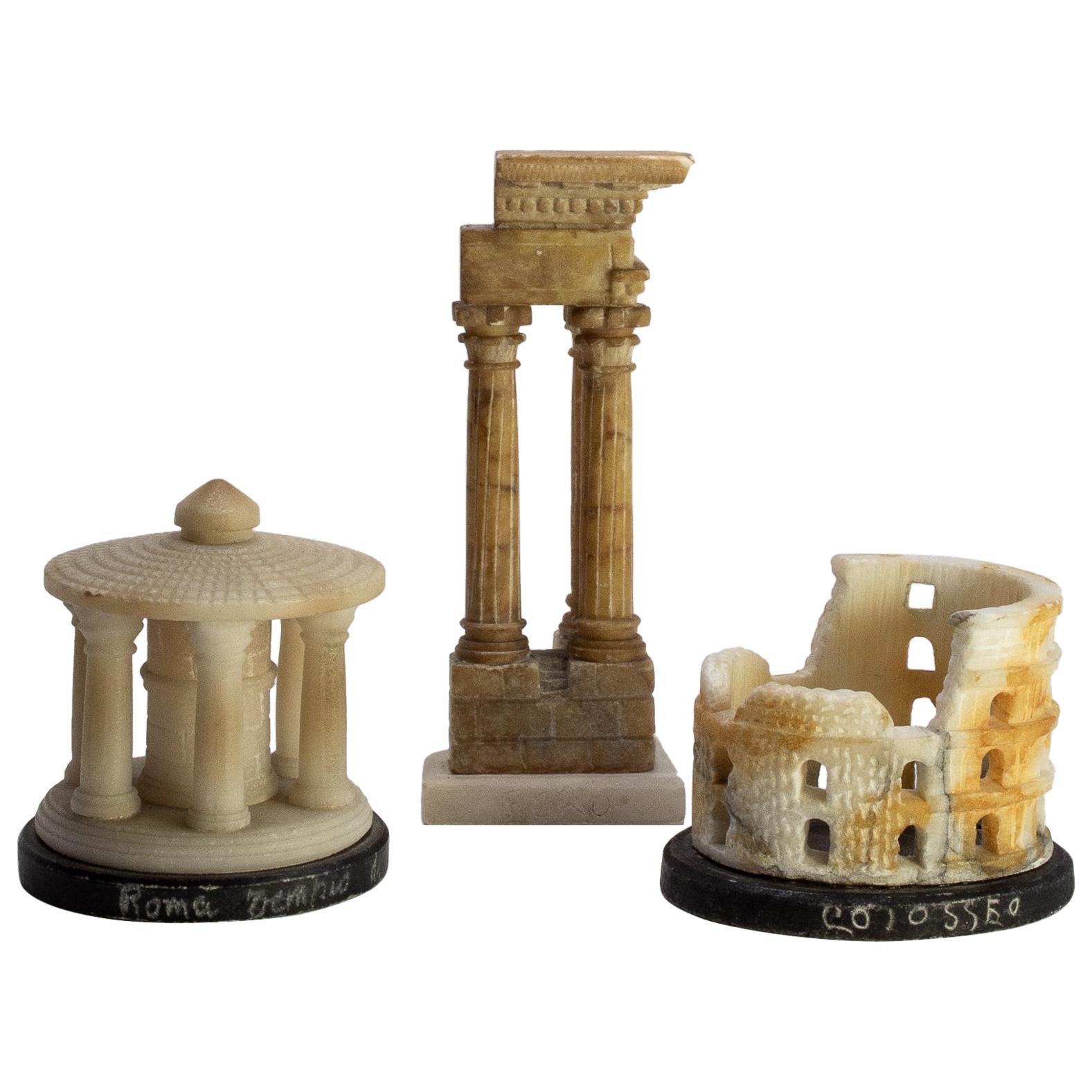 Group of three 19th century. Alabaster Grand Tour models, Rome. 

Start a Grand Tour model collection of the top three Roman architectural souvenirs - the Colosseum, the Temple of Vespasian, and the Temple of Vesta. All made of alabaster quarried