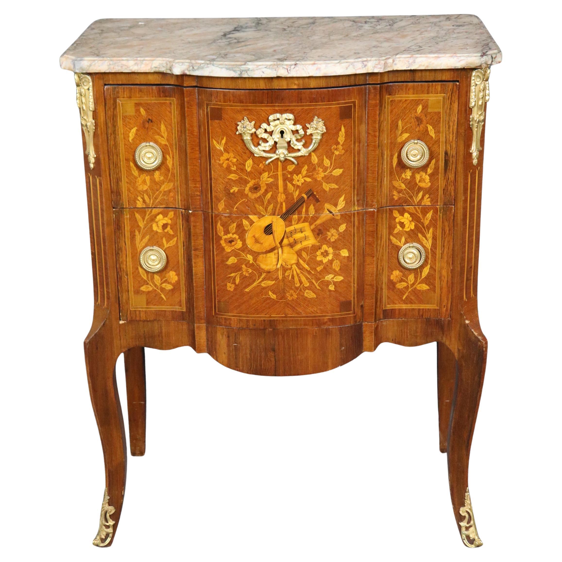 Instrumental Inlaid Kingwood and Satinwood Marble Top French Louis XV Commode