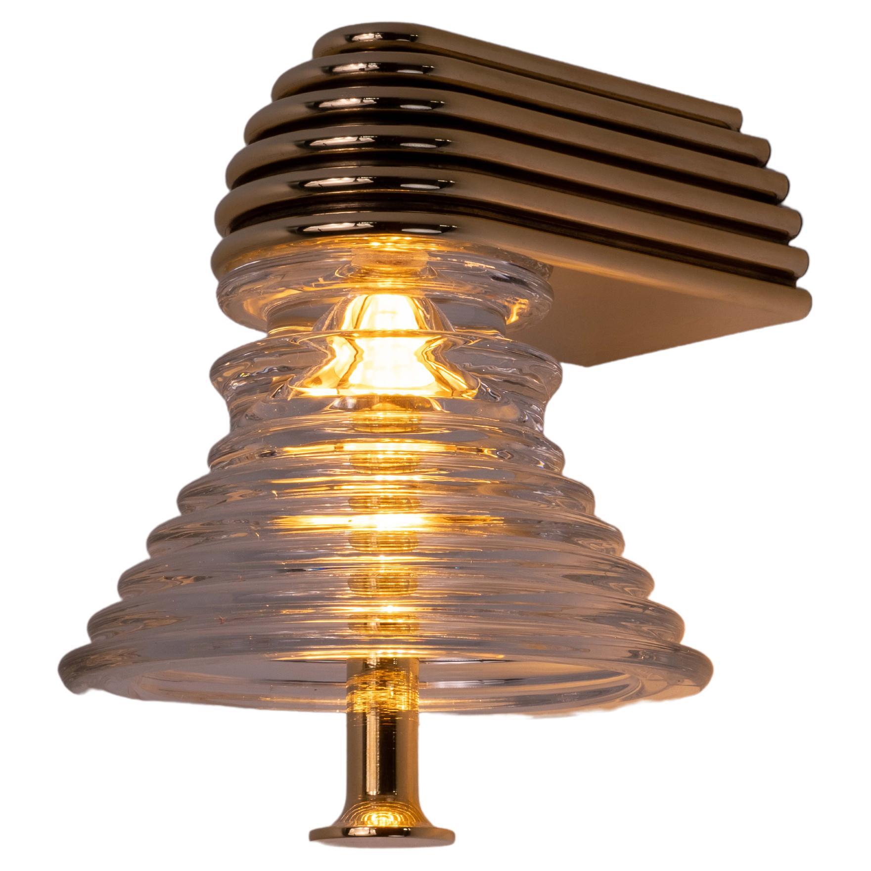 Insulator A Clear Glass and Polished Brass Sconce by Novocastrian