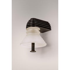 Insulator A Frosted Glass and Dark Brass Sconce by Novocastrian
