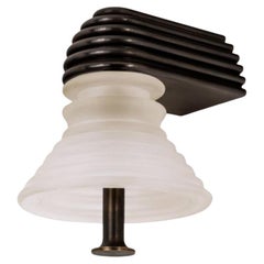 Insulator A Frosted Glass and Dark Brass Sconce by Novocastrian