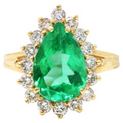 Vintage 4.34 Carats Pear Cut Columbian Emerald Diamond 14 Karat Yellow Gold Ring